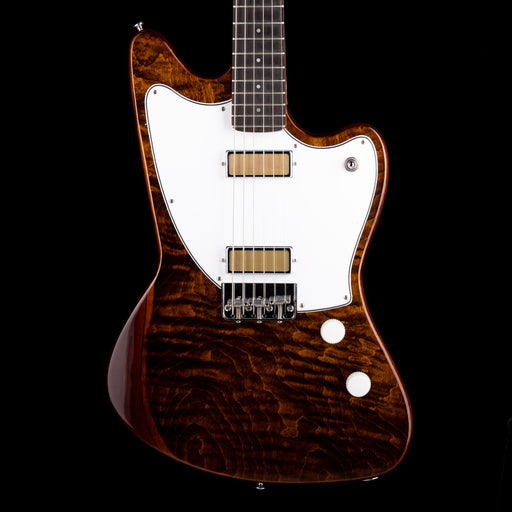 Electric guitar with a brown body and white pickguard on a black background
