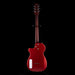 Red electric guitar on a black background