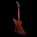 Wooden guitar body on a black background