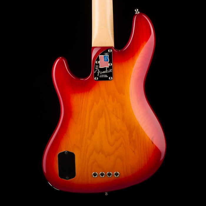 Pre Owned Fender American Deluxe Jazz Bass Aged Cherry Burst With OHSC.