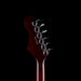 Guitar headstock with brand name on a black background