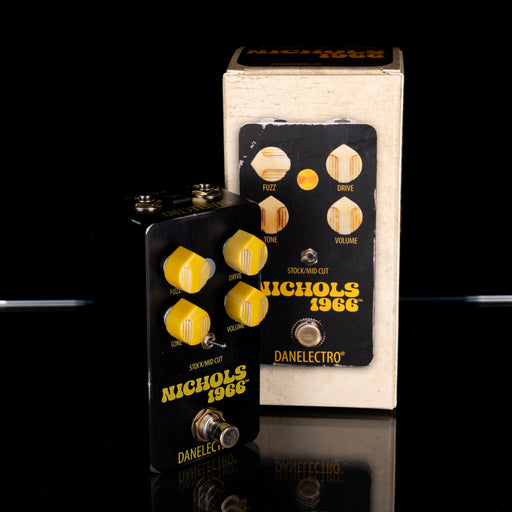 Guitar effects pedal with 'Nichols 1966' branding on a reflective surface.
