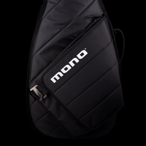 Black sling bag with 'mono' logo on a black background