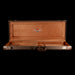 Brown guitar case with Fender logo on a white background