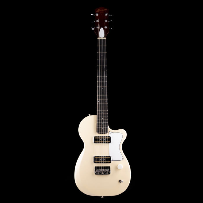 Beige electric guitar on a white background