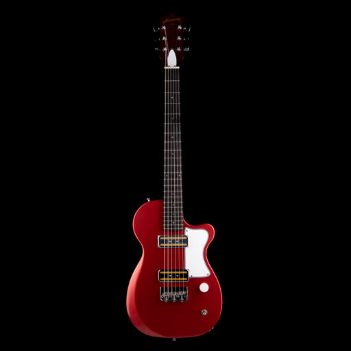 Red electric guitar on a black background