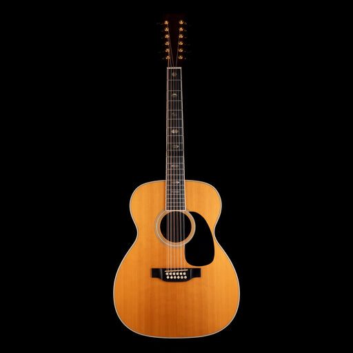 Acoustic guitar on a black background