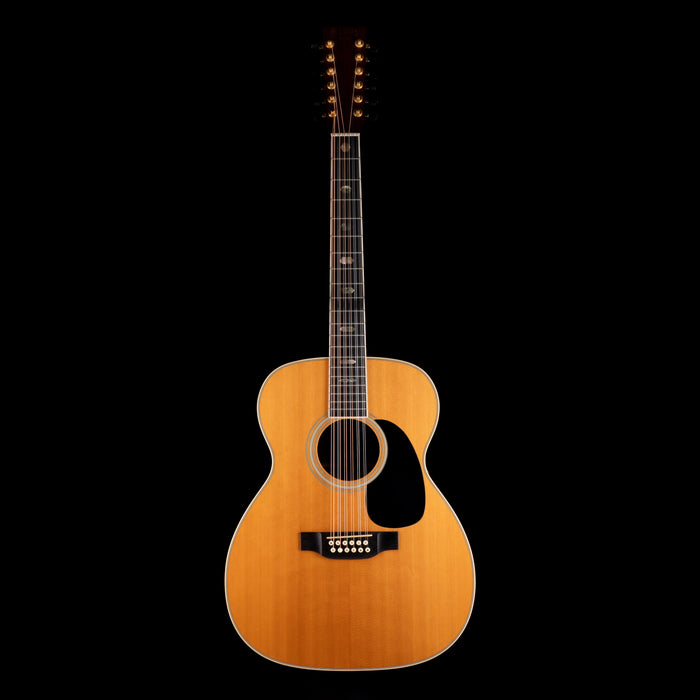Acoustic guitar on a black background