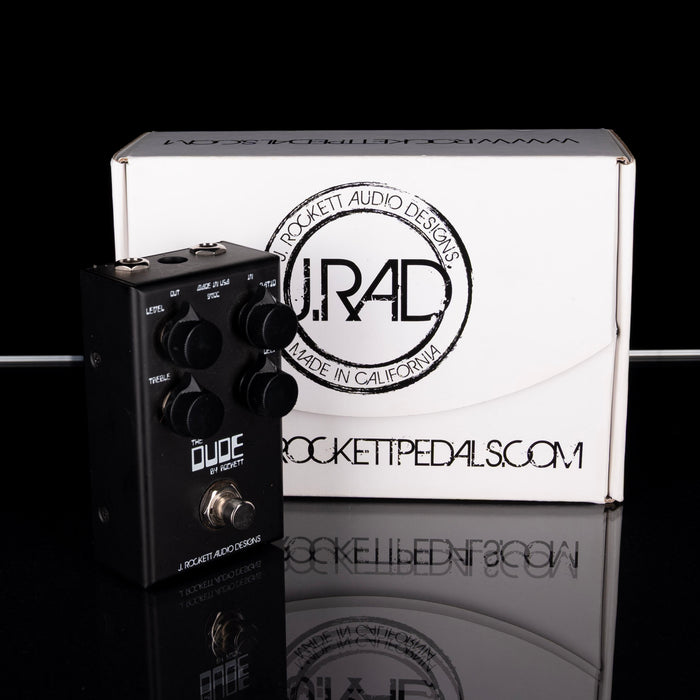 Guitar pedal with Rockett Pedals branding on a reflective surface