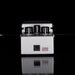 Guitar effects pedal with three knobs on a black background