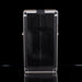 Black speaker grill on a reflective black surface with a white background