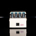Guitar effects pedal with multiple blue lights on a black background