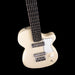 White electric guitar on a black background