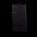 Black rectangular object with textured surface on a black background