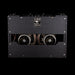 Back view of a guitar amplifier with visible wiring and VOX branding.