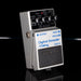 Boss Digital Sampler/Delay pedal on a reflective black surface with a dark background