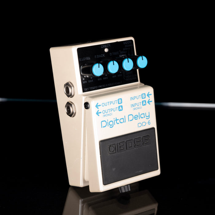 Boss Digital Delay DD-6 guitar effects pedal on a black background