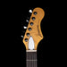 Guitar headstock with 'Fender' branding on a black background