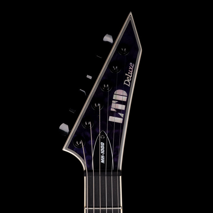 Fender electric guitar headstock on a black background
